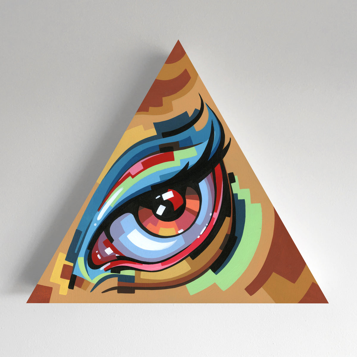 Large red-and-blue eye painted on a tan triangular panel with multicolored curved stripes.