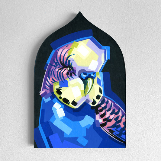 Faceted yellow-and-purple snake painted on a blue Gothic arch panel.