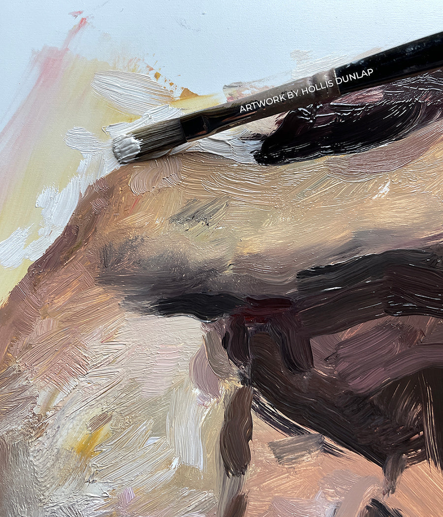 Brush adds pale paint to a textured portrait near an eye.