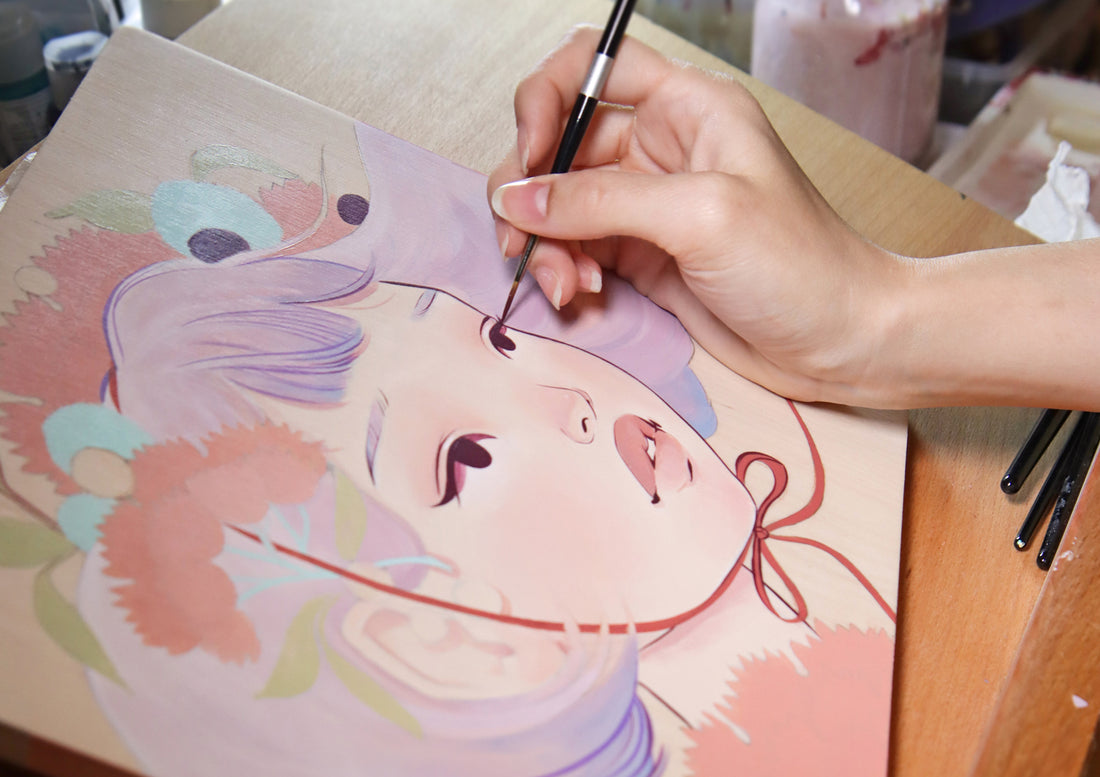 Hand paints a pastel girl's face with purple hair and wide eyes.