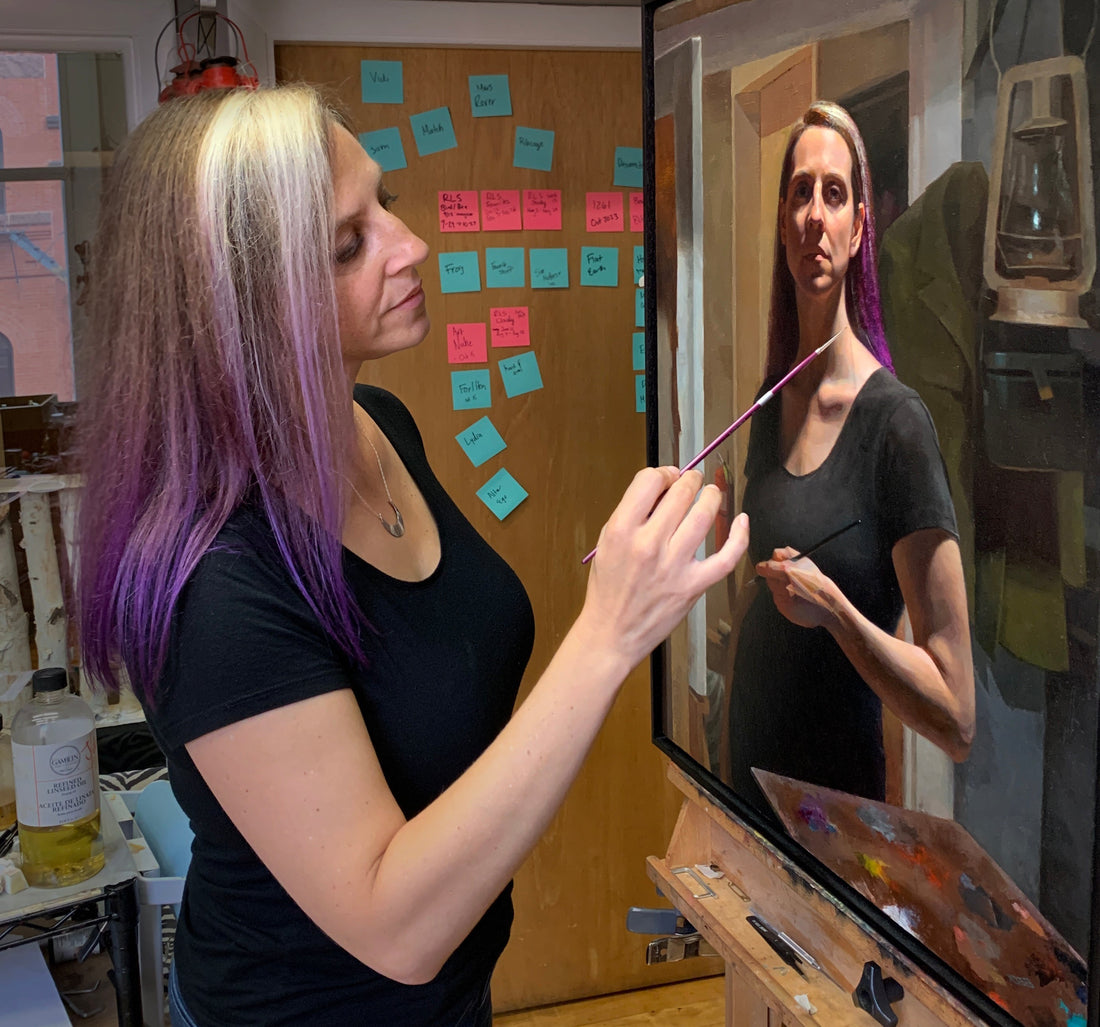 Artist with purple-tipped hair paints a realistic portrait at an easel.