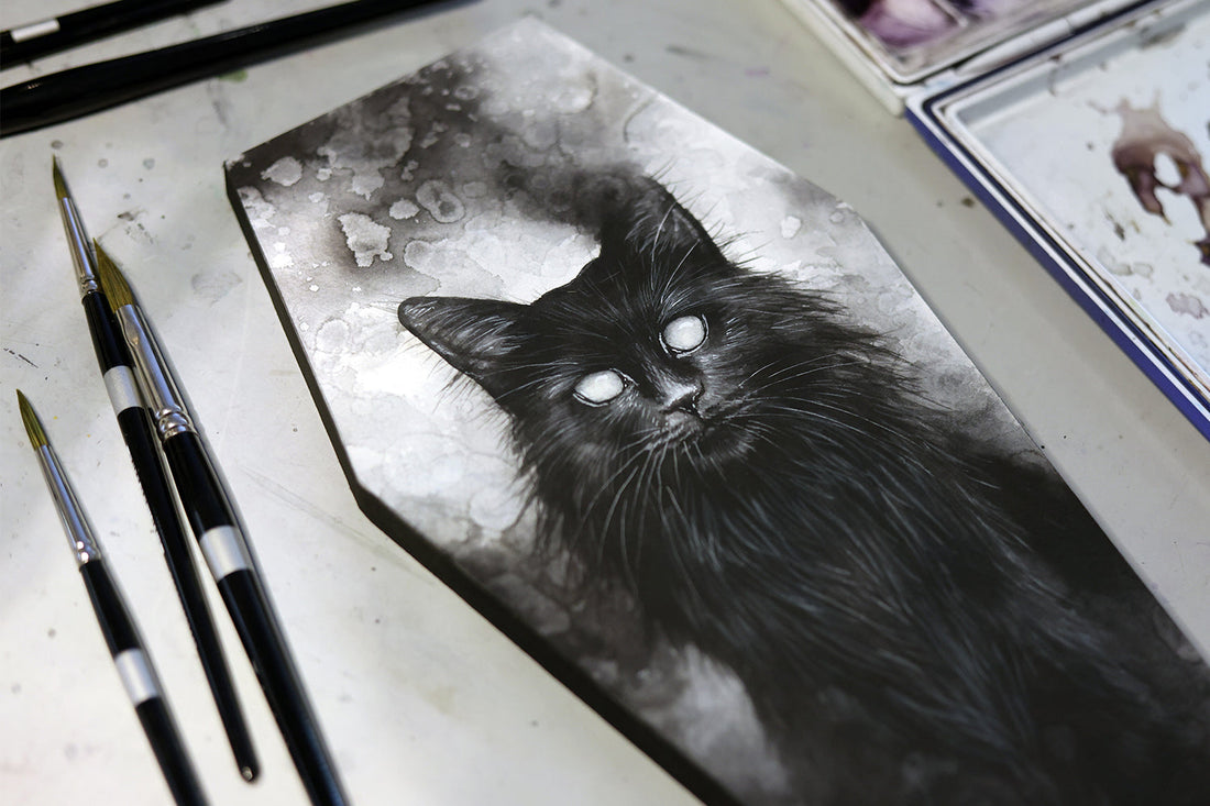 Watercolor paper being mounted onto a wood panel.