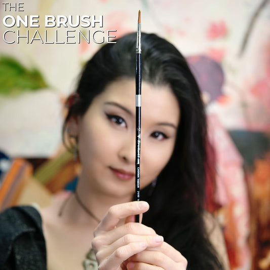 Woman holds a slender brush vertically before her face; text reads One Brush Challenge.
