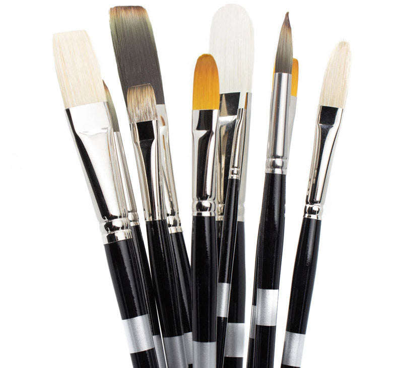 Six black-handled brushes fanned upright with pale and golden bristles.