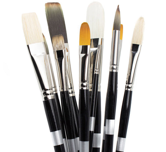 Six black-handled brushes fanned upright with pale and golden bristles.