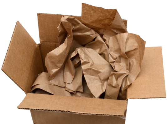 Open cardboard box filled with crumpled brown packing paper.