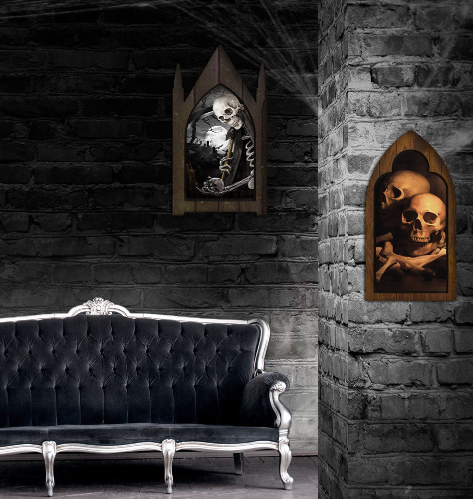 Dark brick room with a couch and framed skull artwork.