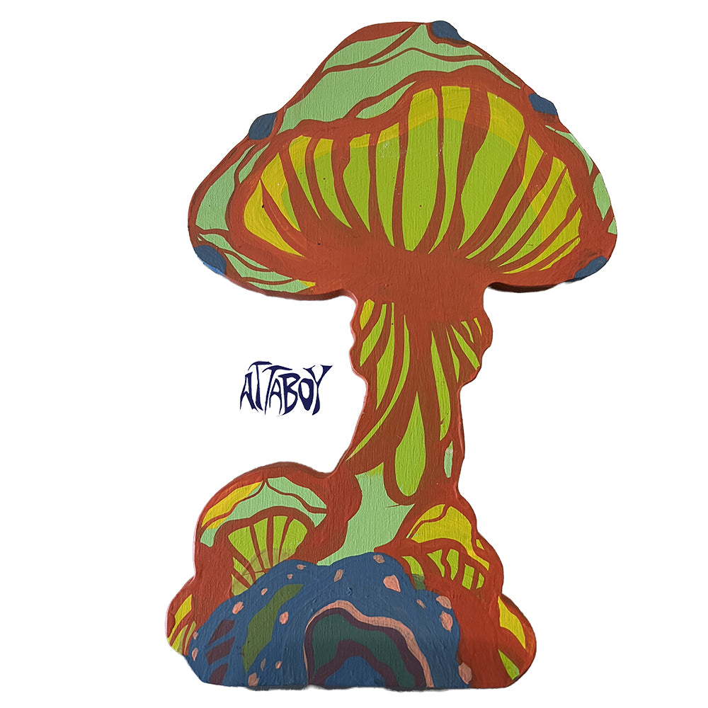 Green-and-yellow mushroom with red outlines above blue smaller mushrooms on a cluster-shaped panel, signed Attaboy.