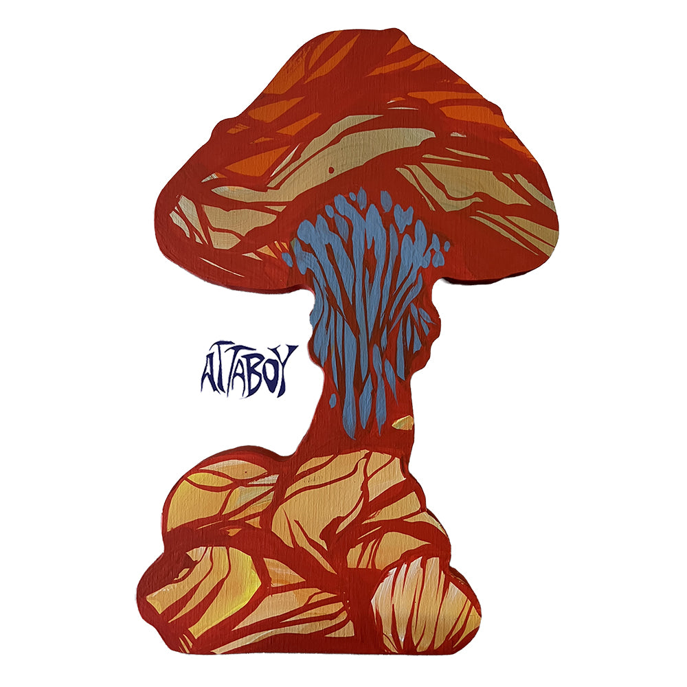 Red mushroom with blue gills and yellow-red smaller mushrooms on a cluster-shaped panel, signed Attaboy.