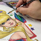Fine brush adds color to a blonde illustrated woman surrounded by colorful stars.