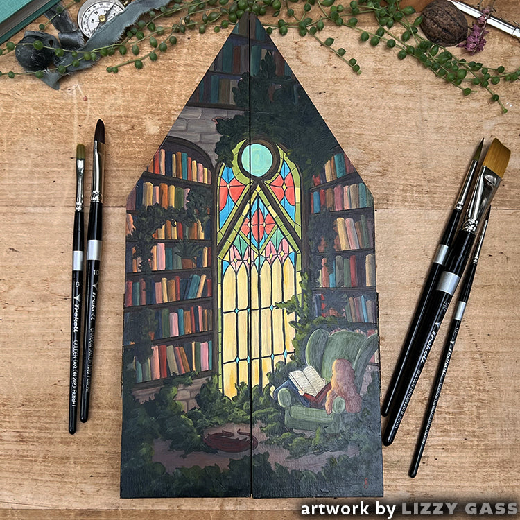 Bookshelves and a stained-glass doorway painted on a Gothic Gable panel, credited to Lizzy Gass.