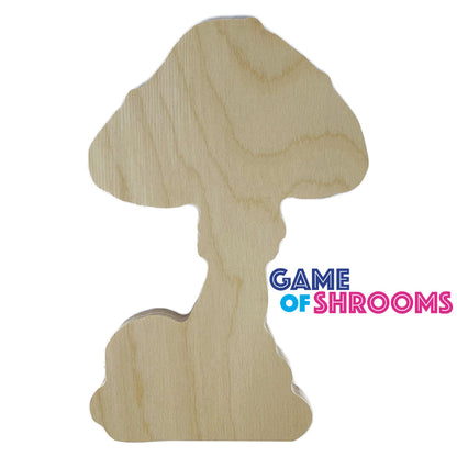 Game of Shrooms cluster panel, front view of an unpainted large mushroom above smaller mushroom shapes.