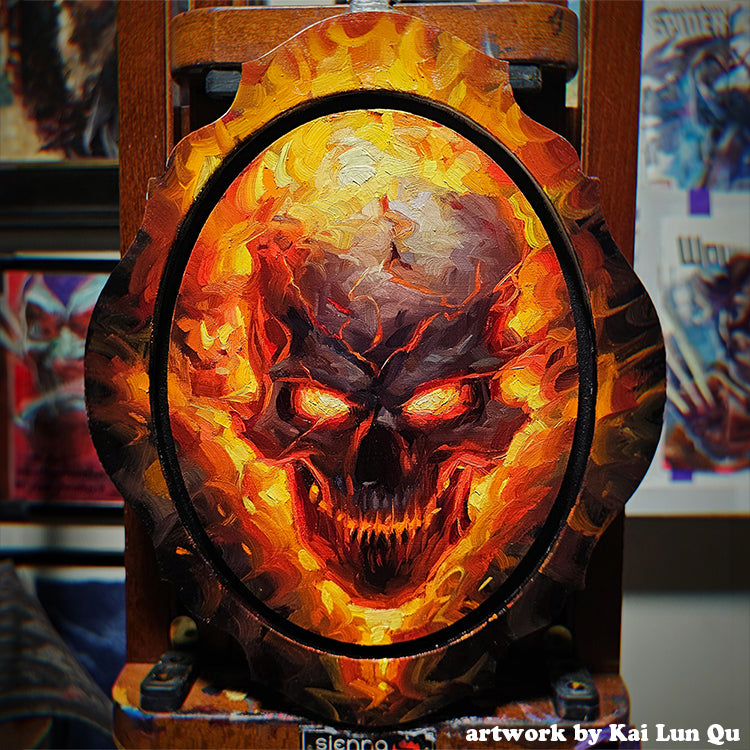 Flaming skull with glowing orange eyes painted on an oval Gothic Portrait panel.