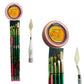 Two sets of green-handled brushes, palette knives and orange-labeled soap tins in their packaging.
