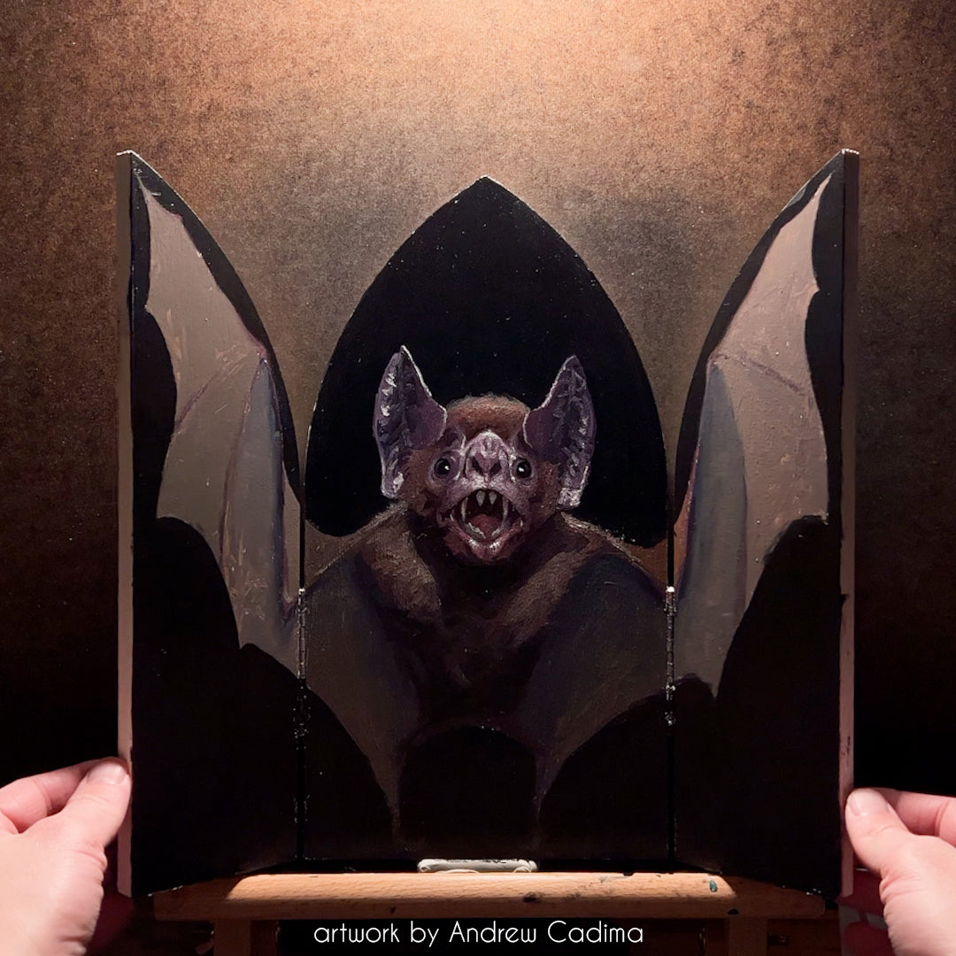 Bat with outstretched wings across an open black Gothic altar panel, credited to Andrew Cadima.