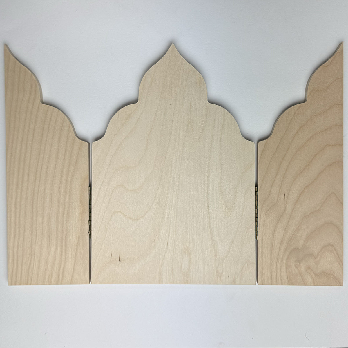 Gothic Cathedral altar panel fully open, unpainted front with three pointed, scalloped sections.