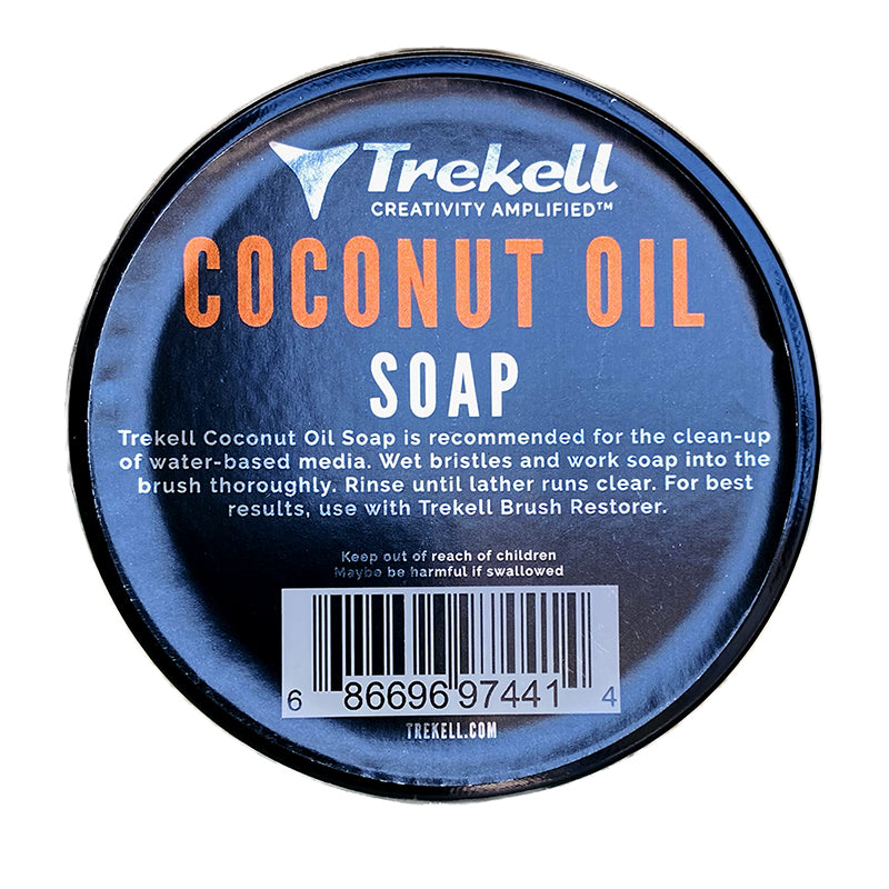 Trekell Coconut Oil Soap tin, top view of its blue label with orange lettering.