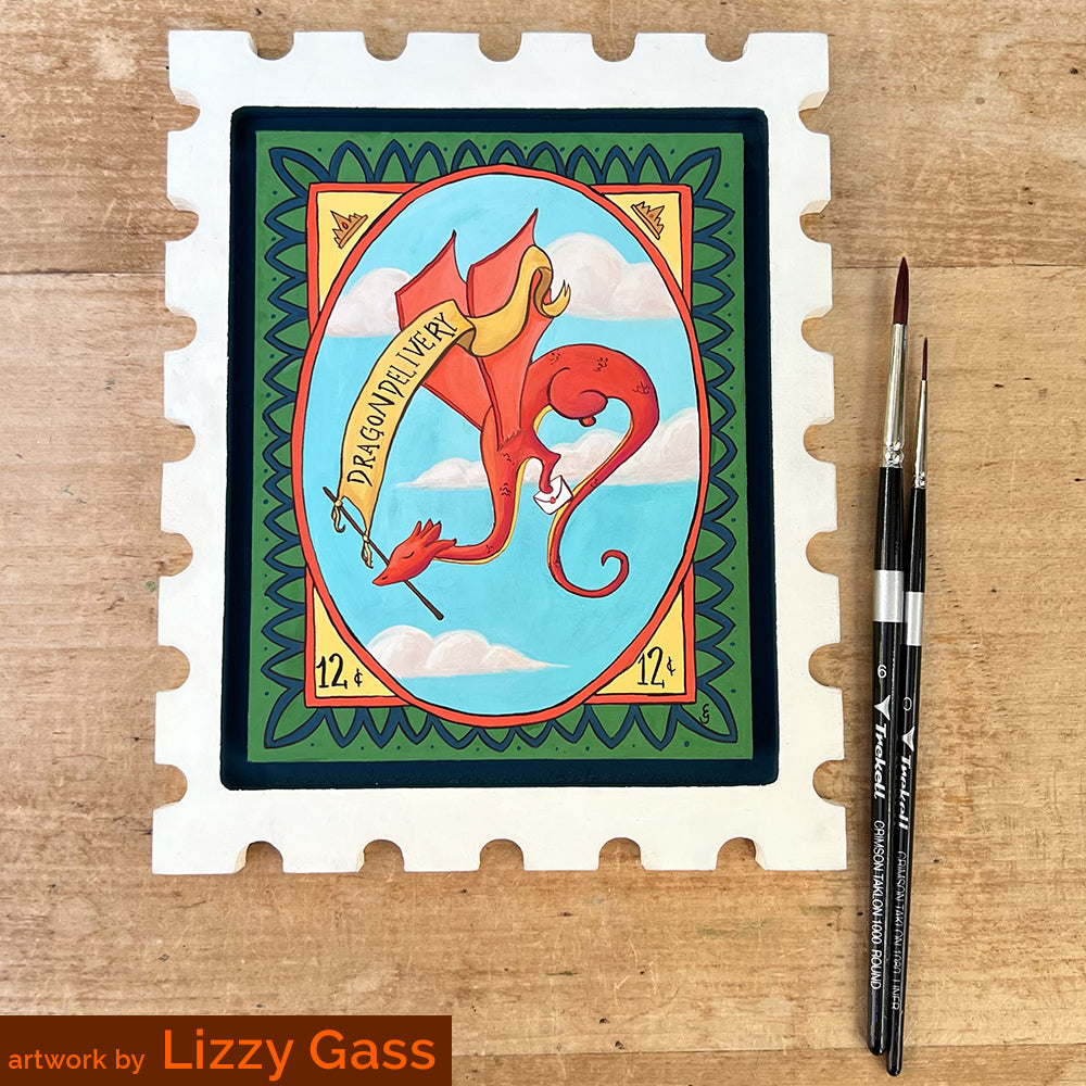 Postage-stamp panel painted with an orange dragon on a blue oval, credited to Lizzy Gass.