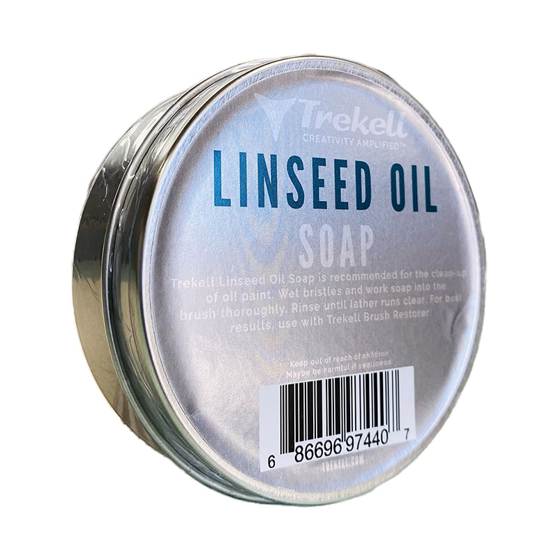 Trekell Linseed Oil Soap tin at an angle, showing its silver lid and blue lettering.