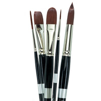 Four black-handled brushes with broad rounded, flat and pointed brown tips.