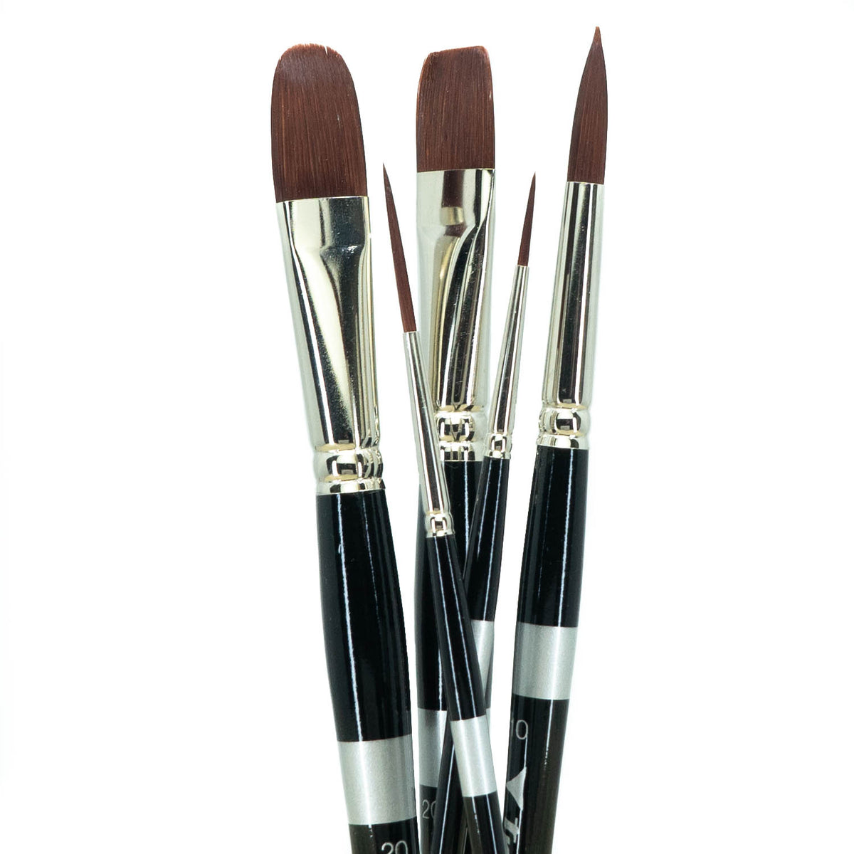 Three black-handled brushes with rounded, flat and fine pointed brown tips.