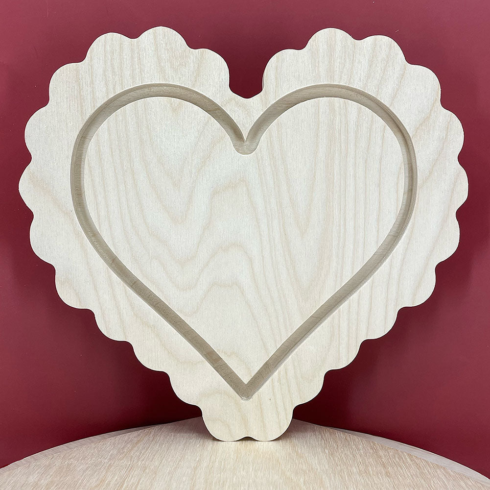 Scalloped heart floater panel, unpainted front with a recessed heart-shaped border.