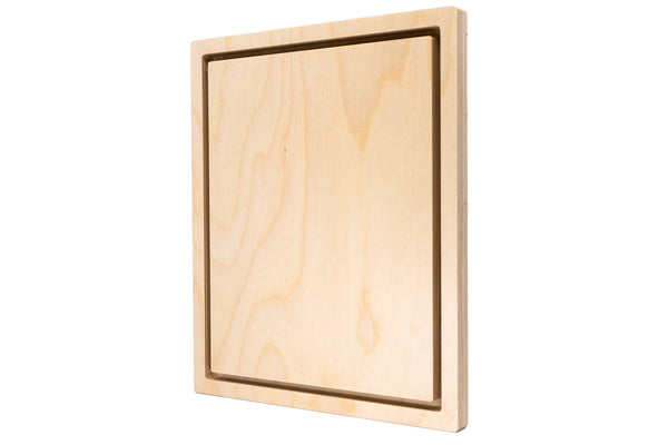 Square wooden floater panel at an angle, showing the inset center and frame thickness.
