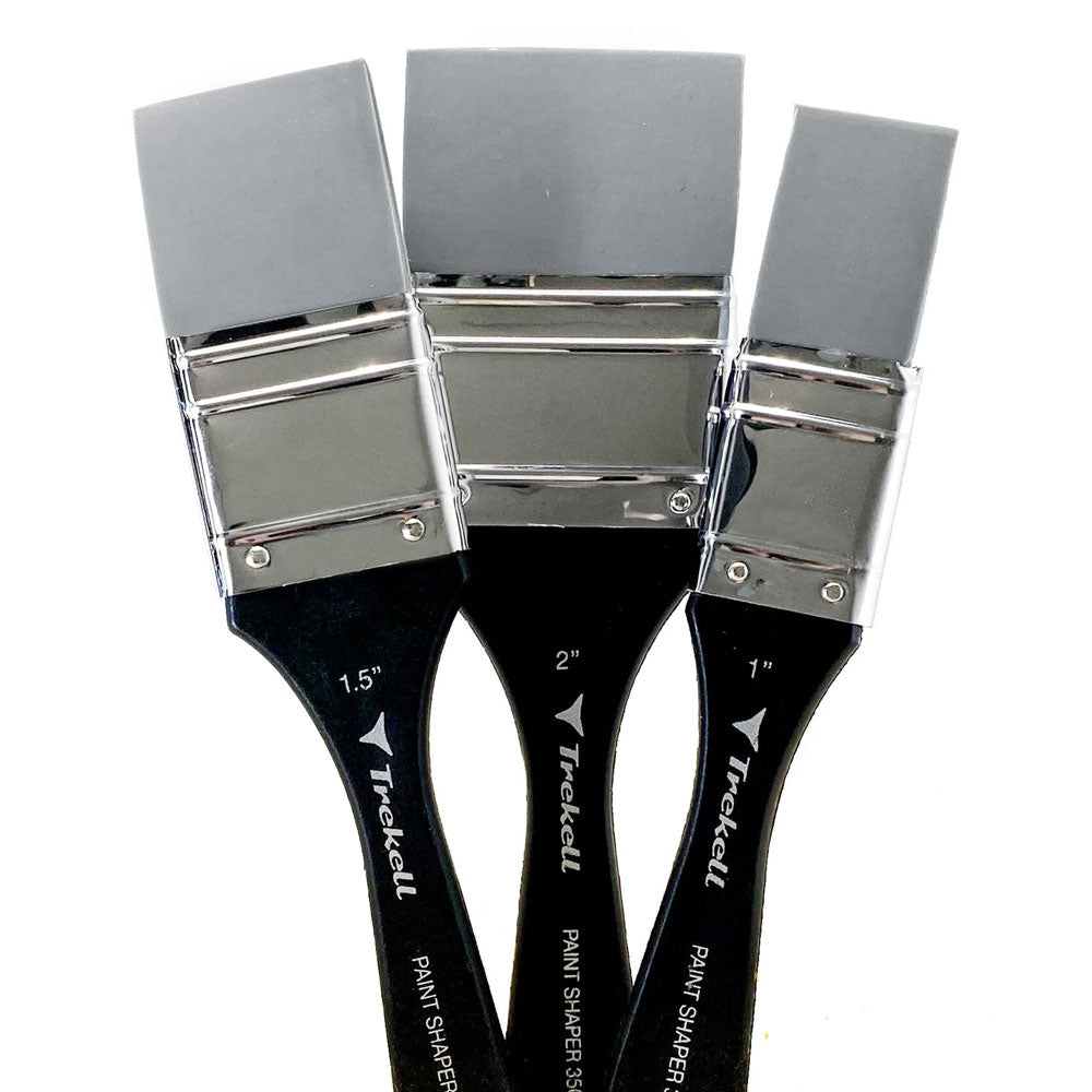 Three varnish brushes with broad silver ferrules, flat gray bristles and black Trekell handles.