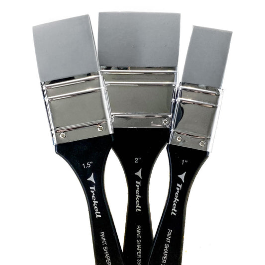 Three varnish brushes with broad silver ferrules, flat gray bristles and black Trekell handles.