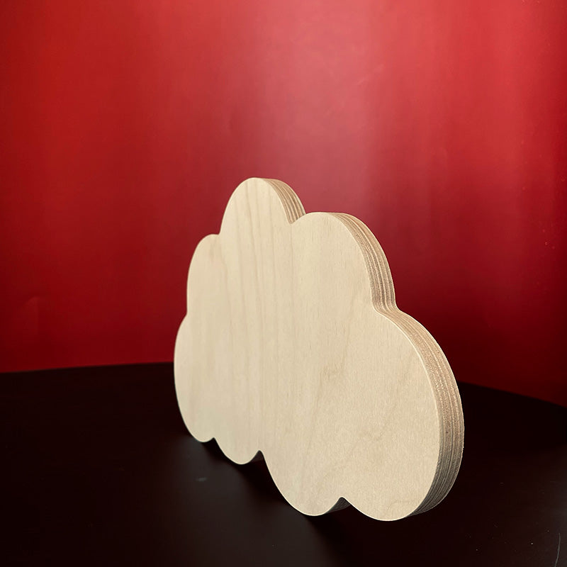 Trekell Cloud Panel standing at an angle against a red background, showing its thick wooden edge.