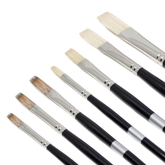 Black-handled brushes with pale flat and rounded bristles fanned diagonally.