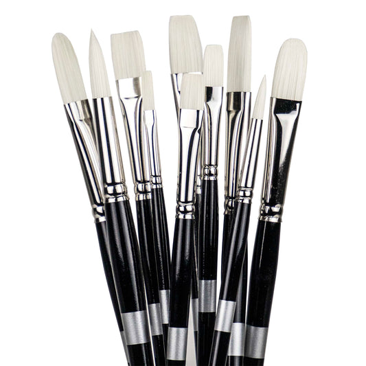 Eight black-handled brushes fanned upright with pale flat, angled and rounded bristles.