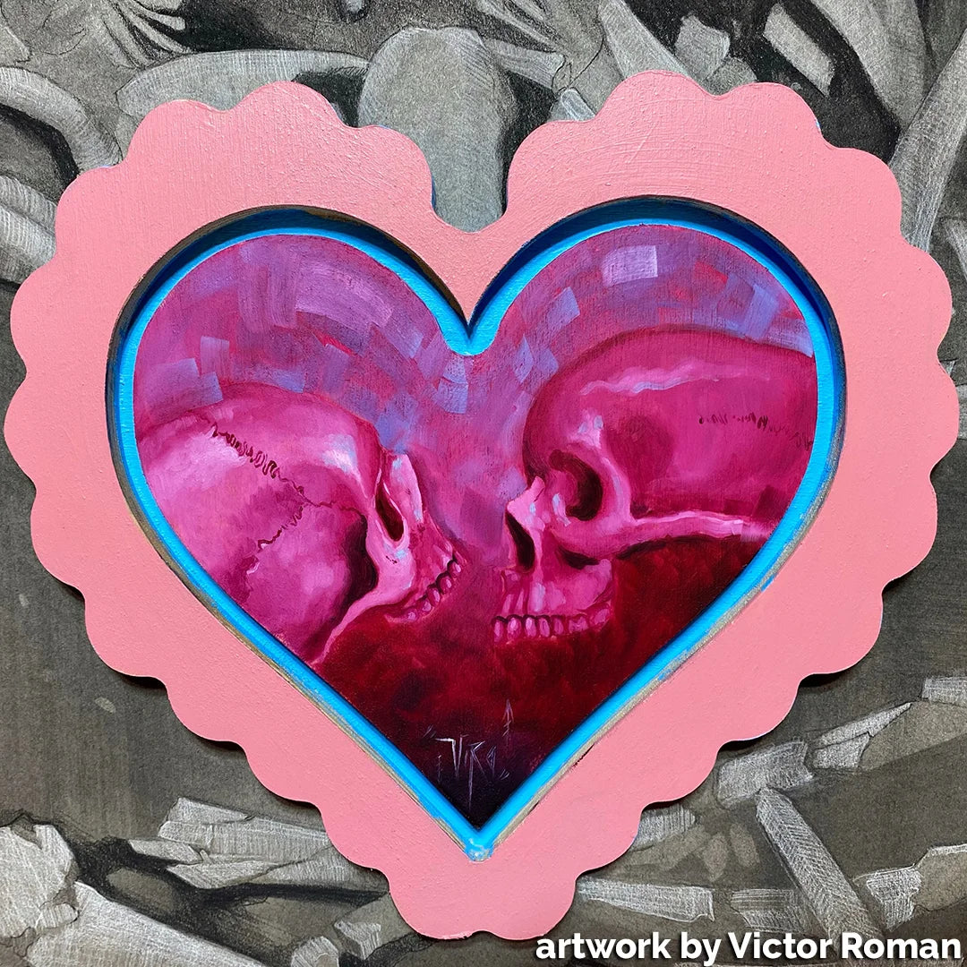 Pink scalloped heart frame surrounding a magenta skull painting, credited to Victor Roman.